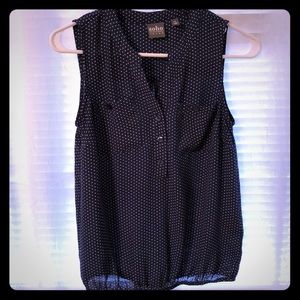 Navy Blue and white polka dot sleeveless blouse